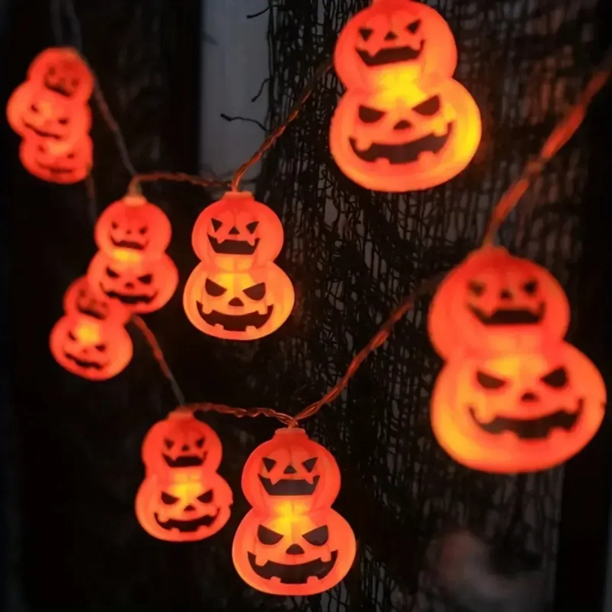 ジャック・オ・ランタン型のストリングライト。電池式で、オレン - Halloween Led String Lights Orange のレビューと価格